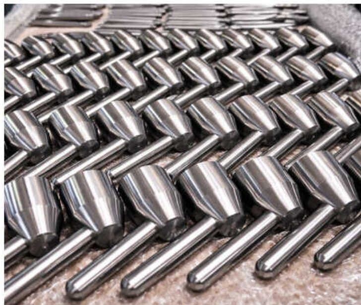 Precision-machined shafts and tooling produced by Aumic Engineering